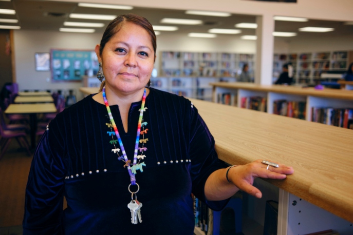 Native American female school teacher staring into the camera